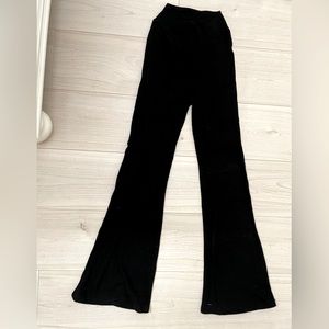 Solid Black flare leggings, cross waist ribbed leggings size Small